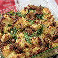 “Breakfast Bread Pudding” — French Bread and Sweet Bread with Italian Sausage and Arugula. © Sugar + Shake