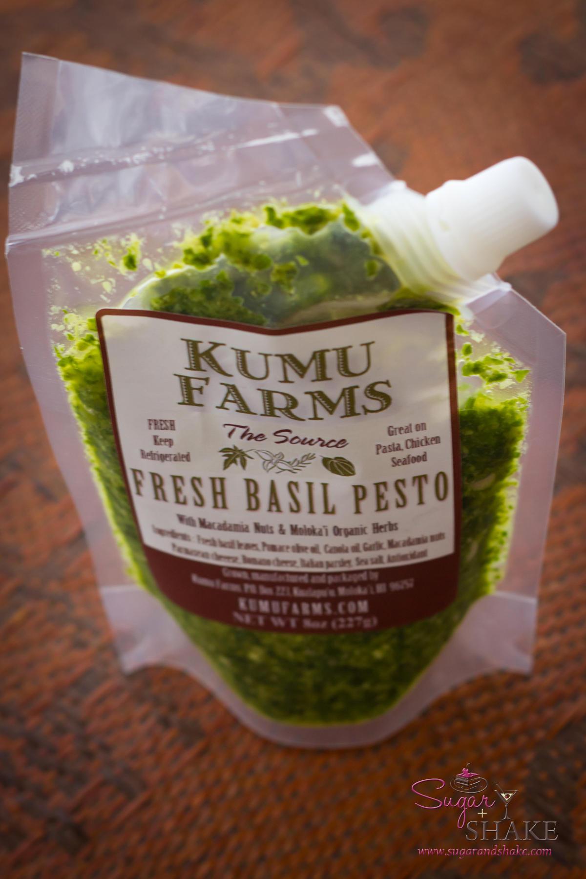 Packaged pesto from Kumu Farms. Fabulous taste, annoying packaging. (The mac nuts — which are great — jam up the spout.) © 2012 Sugar + Shake