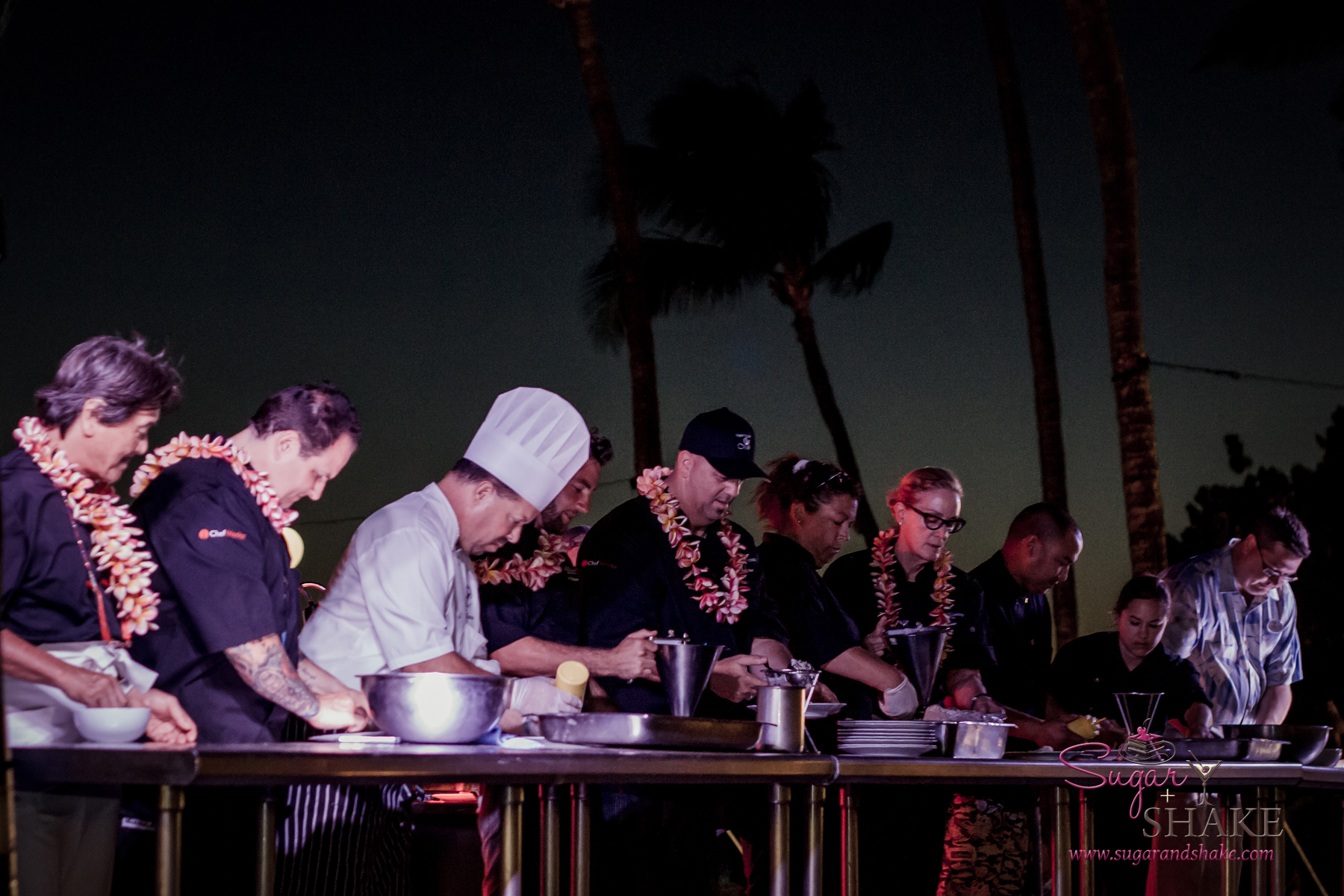 Mālama Maui participating chefs (in black, with lei) from left to right: Hiroyuki Sakai, Rick Tramonto, Marcel Vigneron, Greg Grohowski, Bev Gannon. © 2013 Sugar + Shake