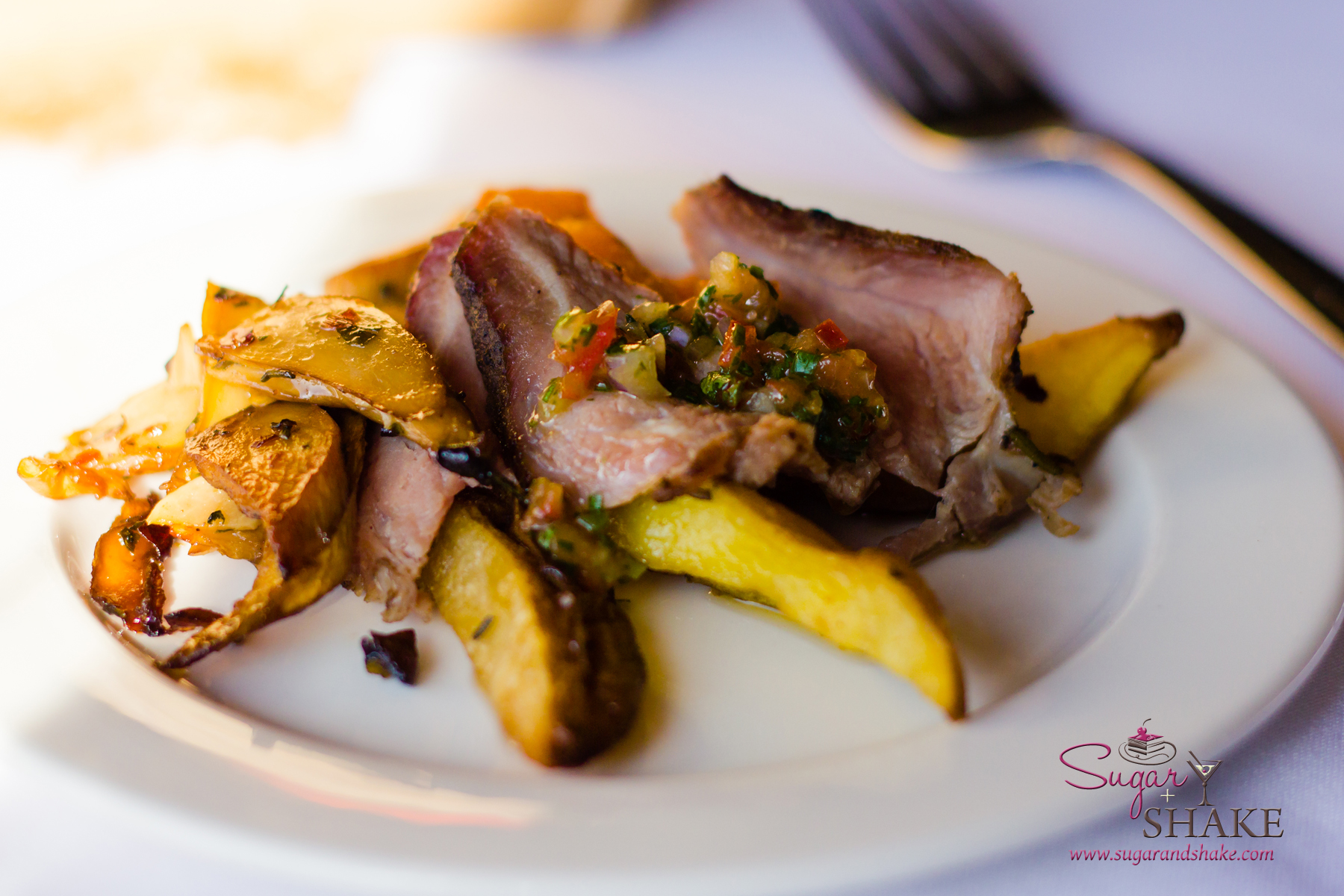 Schwenker-grilled lamb with potatoes at Merriman’s Waimea 25th Anniversary party. © 2014 Sugar + Shake