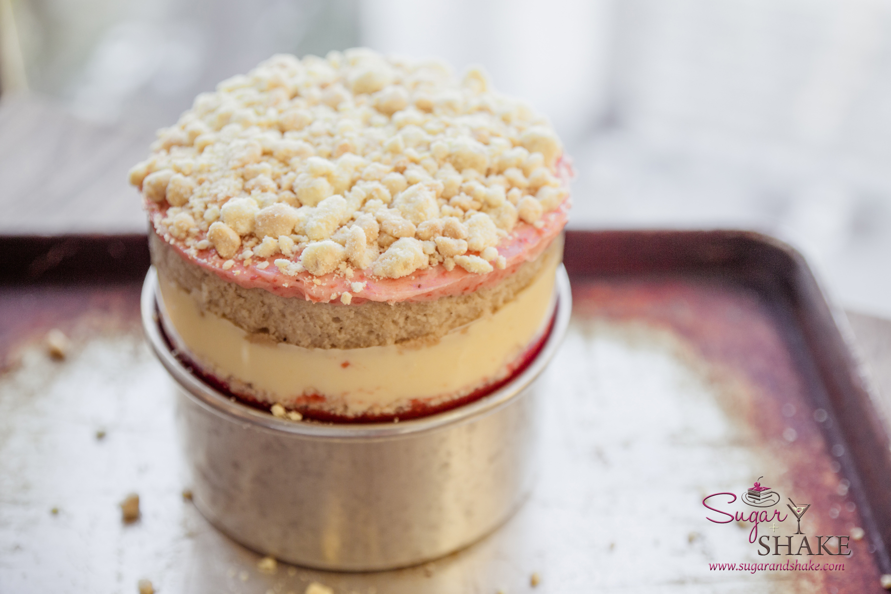 Drool worthy Strawberry Lemon Layer Cake, recipe by Christina Tosi (Momofuku Milk Bar). © 2015 Sugar + Shake