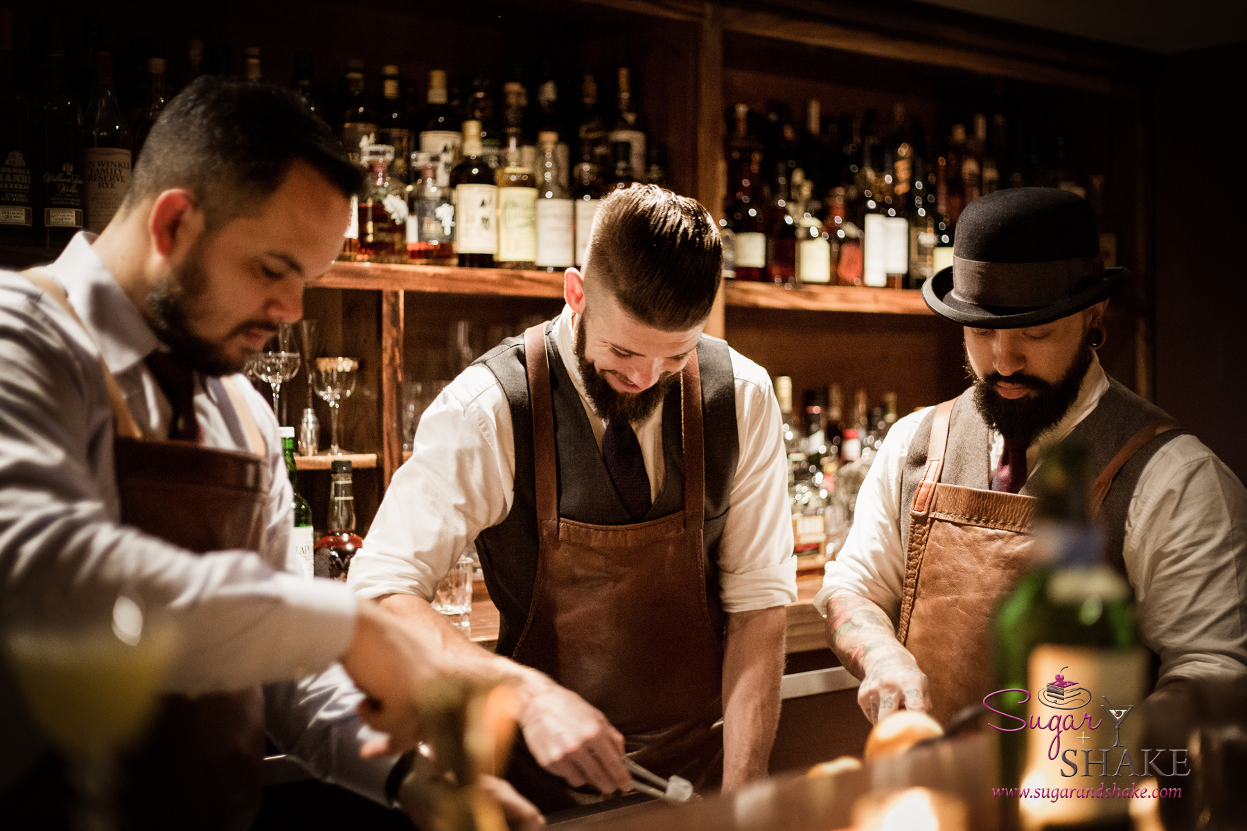 Bar Leather Apron’s Justin Park on the left, with his bar crew of Art Deakins (center) and Luke Atay, involved in some serious bar prep. © 2016 Sugar + Shake